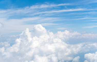 Naklejka na ściany i meble Cloud and blue sky view from airplane