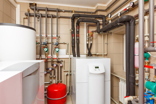 Household boiler house with heat pump, barrel; Valves; Sensors and an automatic control unit