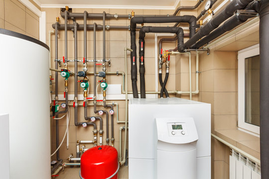 Household boiler house with heat pump, barrel; Valves; Sensors and an automatic control unit