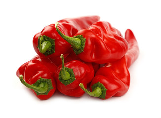 Red paprika peppers close up isolated on white