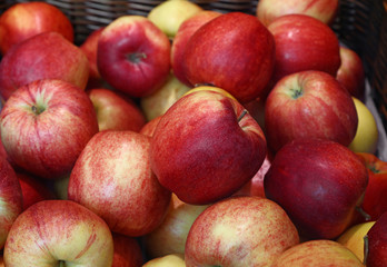 Fototapeta na wymiar Fresh red apples on retail market close up