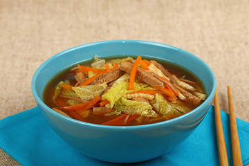 Asian noodle ramen soup with beef and vegetables