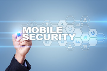 Businessman drawing on virtual screen. mobile security concept.