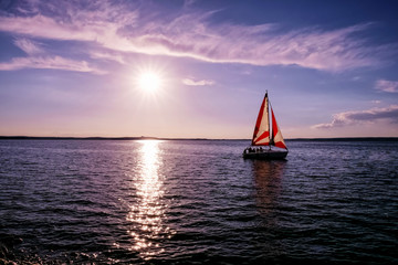 Sailboat on the lake, landscape sunset
