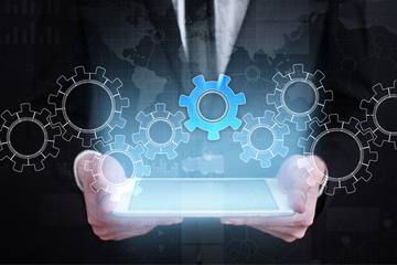Gears on virtual screen. Business strategy and technology concept.