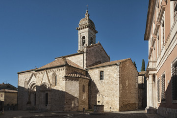 Fototapeta na wymiar SAN QUIRICO D'ORCIA, ITALY - OCTOBER 30, 2016 - Medieval catholic church in Tuscany, la Collegiata (sec. XIV) antique cathedral of San Quirico d'Orcia, Siena, Italy