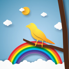 Bird on branch with rainbow and cloud , paper art style