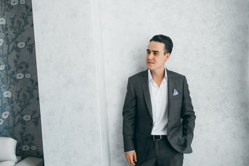 Young groom in the morning 