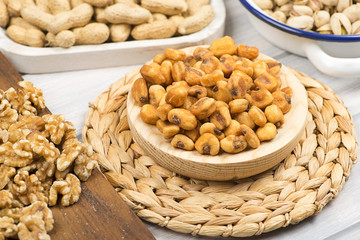 Walnuts and toasted corn.