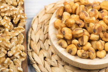 Walnuts and toasted corn.