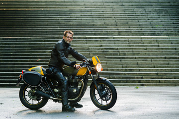 Obraz na płótnie Canvas Rider on his street-style motorbike 