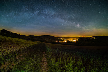 Astro Landscape with the Milky Way as seen from the Odenwald between Lampenhain and Vorderheubach (near Heiligkreuzsteinach) in Germany.