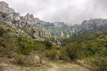 Clouds over The rock formations of the Demerdji mountain. Valley of Ghosts. Landscape of Crimea, Russia. Ukraine