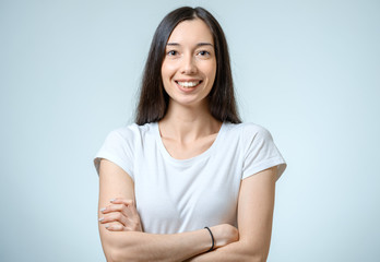 Portrait of young positive woman.