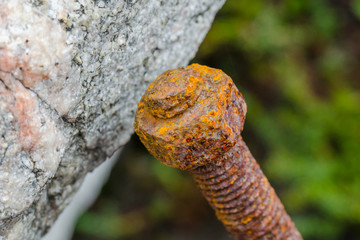 Old bolt and nut covered with rust.