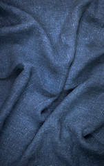 Fototapeta premium Burlap close-up, natural coarse cloth, tablecloth with folds