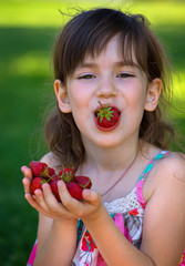 Girl and strawberry