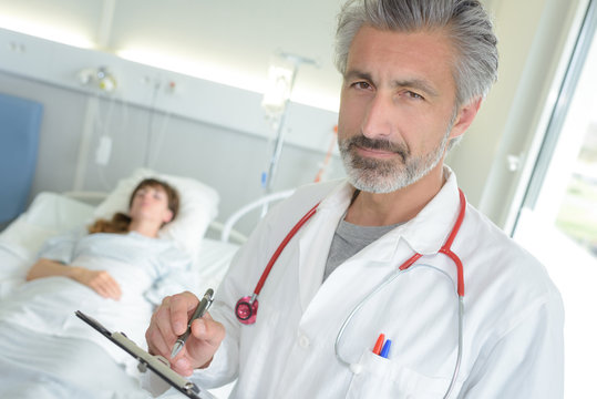 doctor posing in the patient's room