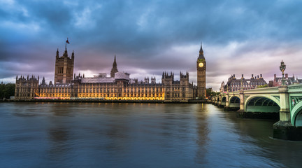 View of the Houses of Parliament and Westminster Bridge in London at sunset
