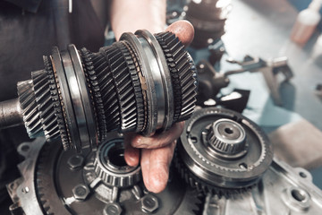 Cross-section of a car gearbox. mechanic work in the garage