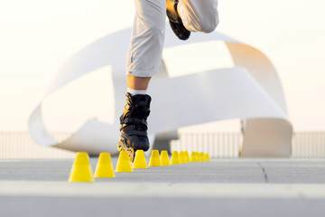 roller skater with inline skates in sea promenade , extreme sport athlete