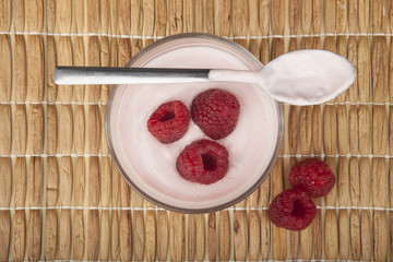 glass of fresh berries and yogurt