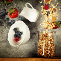 Flying breakfast against grey wall