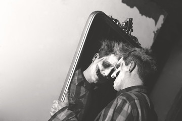 sad clown cry in front of mirror © fran_kie