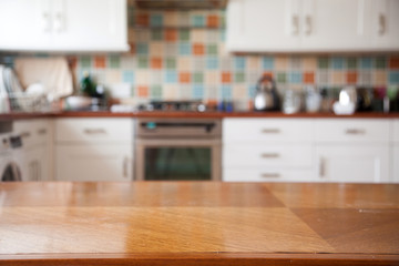 blurred kitchen interior and napkin and desk space