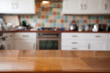 blurred kitchen interior and napkin and desk space