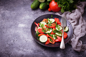Vegetable salad with cucumber and tomato