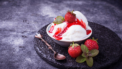 Ice cream with strawberry topping