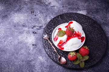 Ice cream with strawberry topping