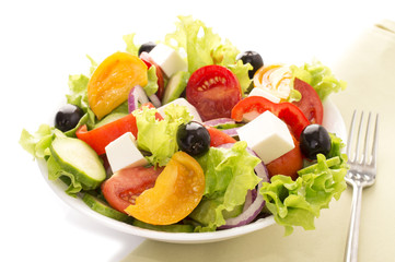 fresh vegetable salad isolated on white background