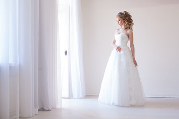bride in white dress before wedding