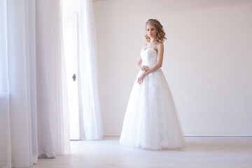 bride in white dress before wedding