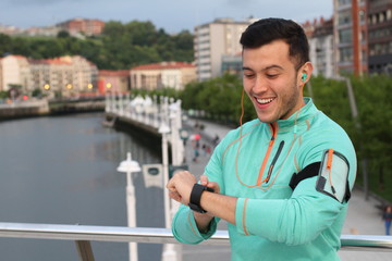 Man using his smart watch while during work out session