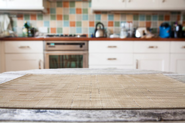 blurred kitchen interior and napkin and desk space