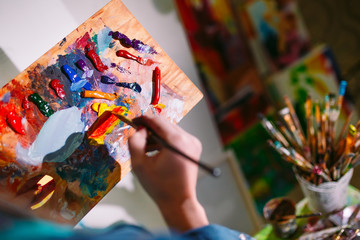 Fototapeta premium Girl in Painting Studio