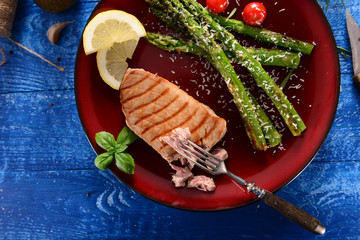 Grilled Tuna steak with roasted asparagus and parmesan