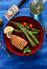 Grilled Tuna steak with roasted asparagus and parmesan