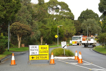 Melbourne, Victoria, Australia - June 17, 2017: Road works road closed and detour sign - 159667145