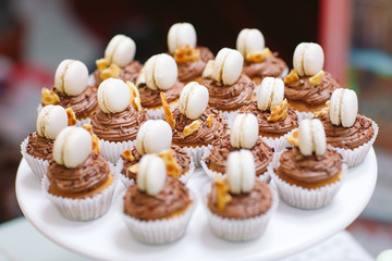 Trifles in plastic glasses.