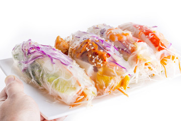 Vietnamese Spring Rolls, large variety of filled, rolled appetizers or dim sum found in East Asian and Southeast Asian cuisine