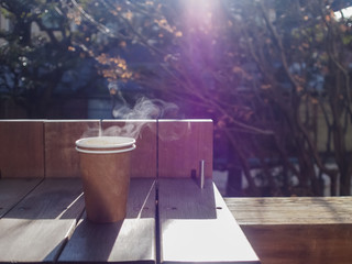 coffee / Steam from hot cup on natural  background, Vintage color. Selective focus.