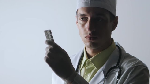 The doctor offers a choice between a noose and a medicine. The choice between suicide or treatment.
