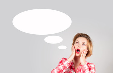 Beautiful  woman with empty speech bubbles, looking up.