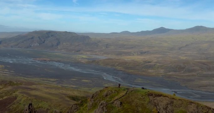 ICELAND – SEPTEMBER 2016 : Aerial shot of beautiful mountaintop in Thorsmörk National Park with people in view on a sunny