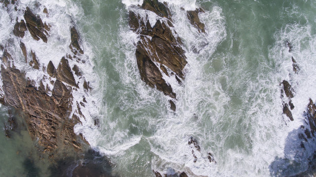 Aerial view of ocean waves and fantastic Rocky coast
