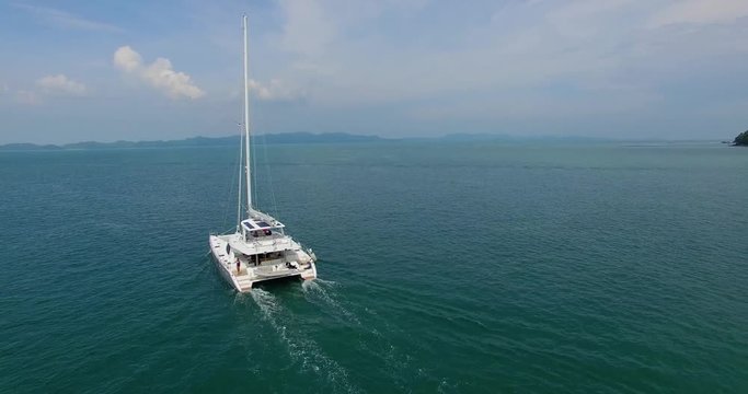 Aerial:Beautiful Luxury Yaht With Pretty Model Sailing In Andaman Sea. Thailand.